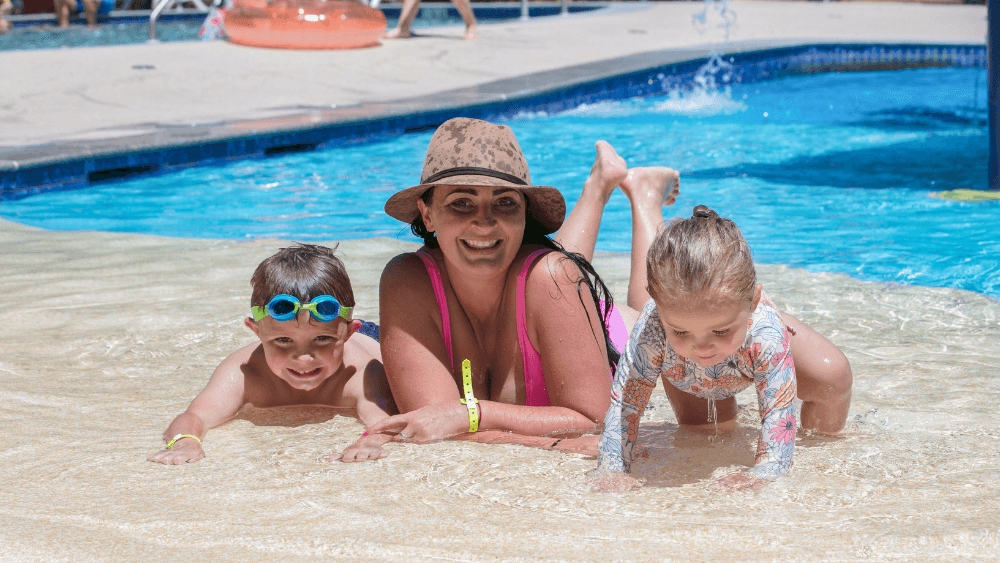 mum and children relaxing in the pool at paradise resort gold coast