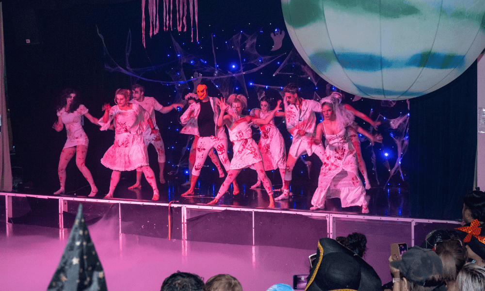 dancers on staged dressed as zombies