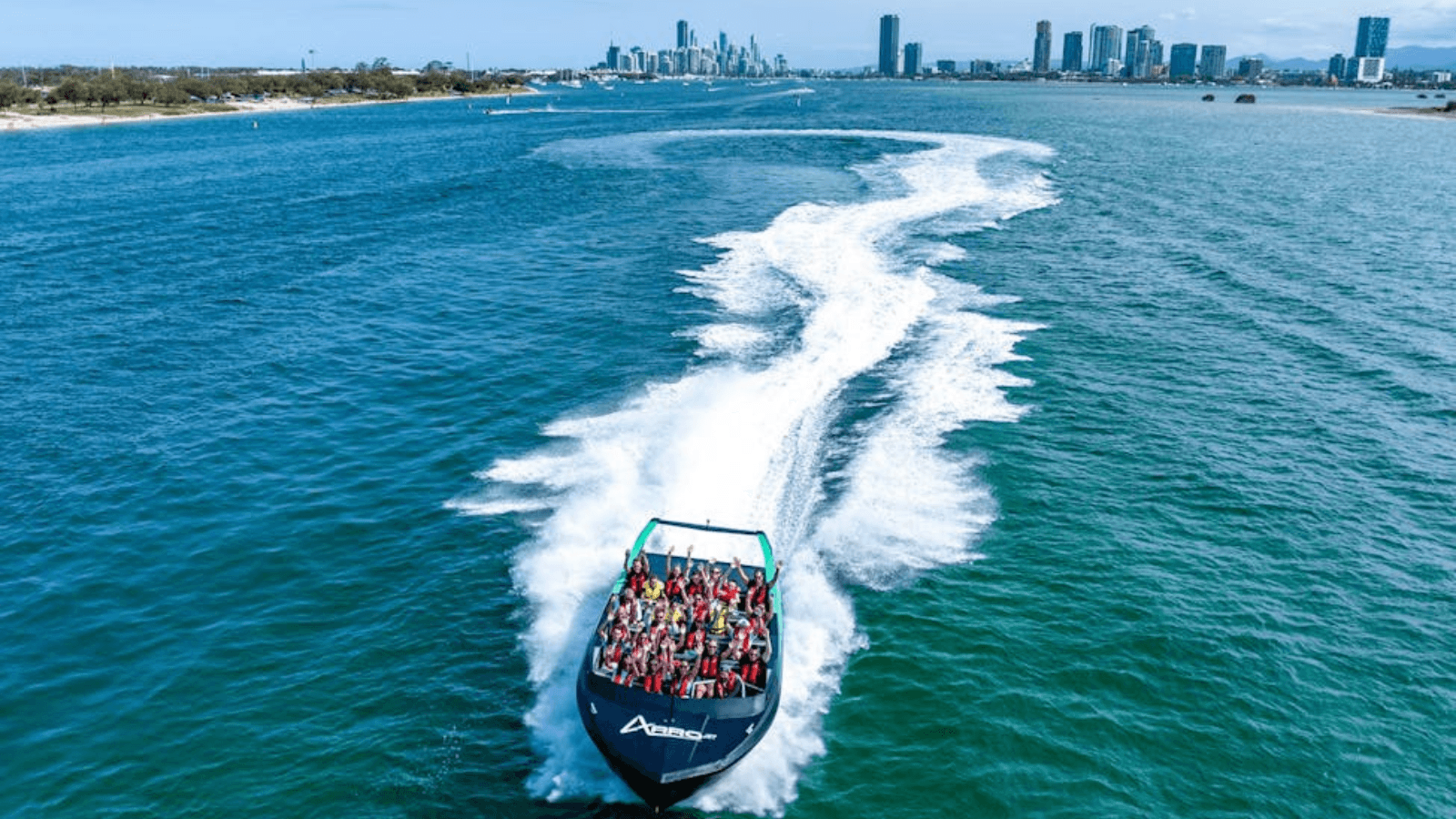 arro jet jet boating with gold coast city buildings in the background