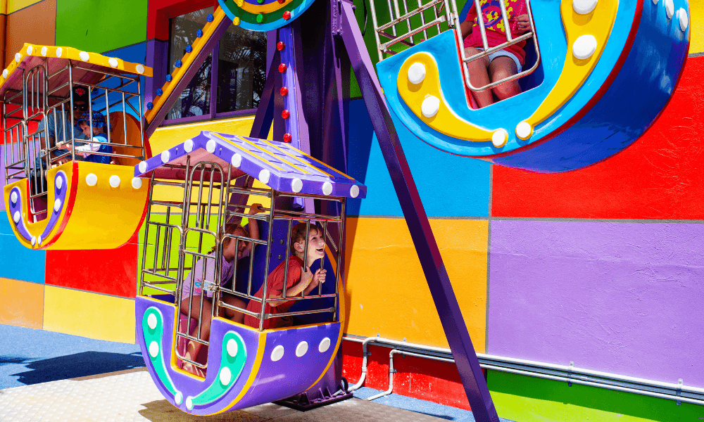 Kids on a mini ferris wheel at Paradise Resort Gold Coast