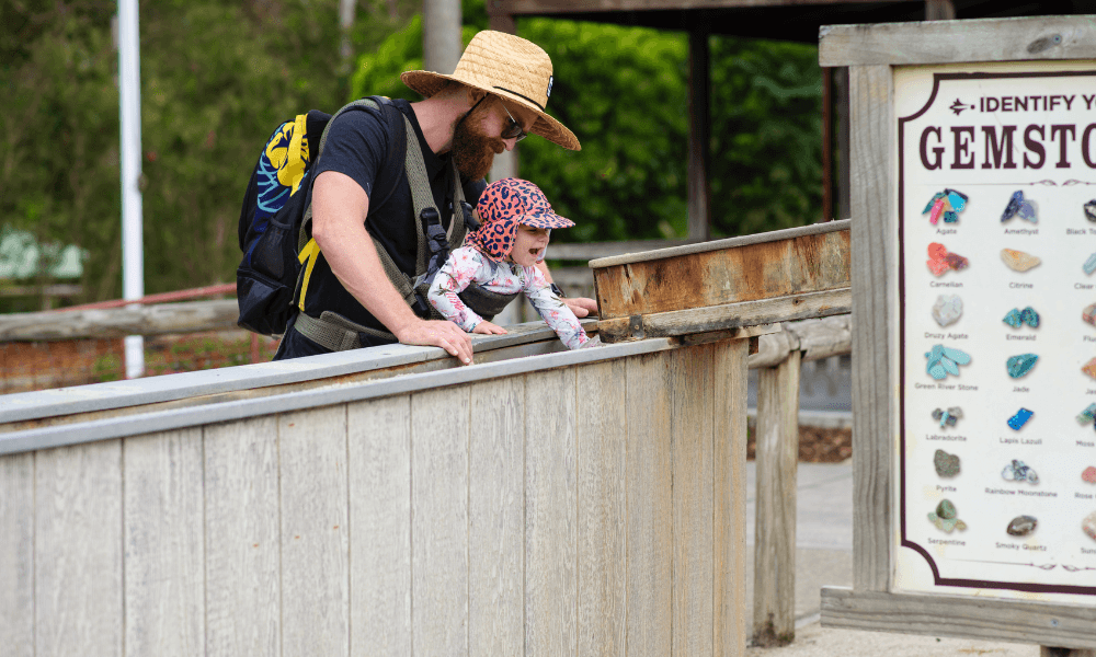 Father and daughter gold panning at Paradise Country